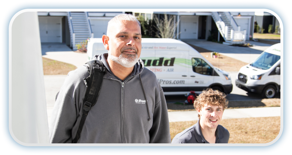 two technicians walking to customers home